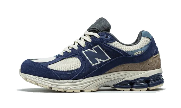 New Balance 2002R Navy Cream: stile retrò e ammortizzazione ABZORB per l'uso quotidiano