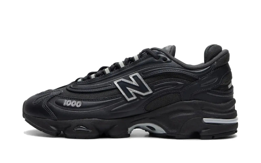New Balance 1000 Regenwolk Pakket Zwart: Zwarte schoenen met stijl en demping voor elke stap