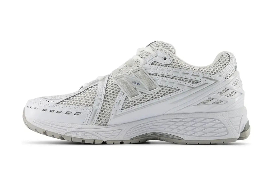 New Balance 1906R White Team Royal: white and royal blue sneakers with a vintage style and cushioning
