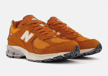 New Balance 2002R Protection Pack Vintage Orange Next Step