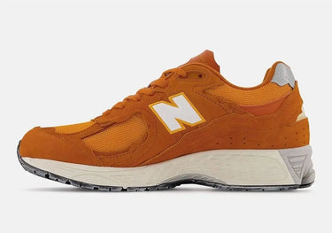 New Balance 2002R Protection Pack Vintage Orange Next Step
