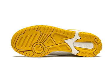 New Balance 550 Sea Salt Varsity Gold Next Step