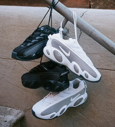 Nike NOCTA Glide Drake White Black Next Step